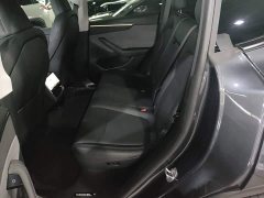 Tesla Model Y Rear-Wheel Drive - ფოტო 17