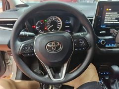 Toyota Corolla 1.2T S-CVT Elite - ფოტო 11