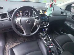 Nissan Qida Tiida 1.6L CVT Smart Edition - ფოტო 19