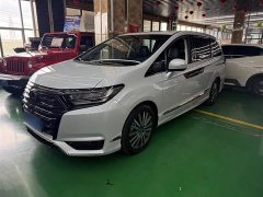 Honda Odyssey 2.0L e:HEV Luxury - ფოტო 1