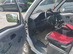 Wuling Zhiguang 1.5L Practical 5/7-seater - ფოტო 12
