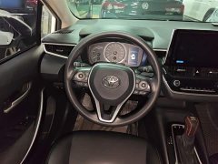 Toyota Corolla 2021 Hybrid 1.8L E-CVT Elite - ფოტო 11