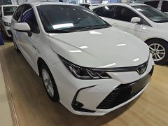 Toyota Corolla 2021 Hybrid 1.8L E-CVT Elite - ფოტო 4