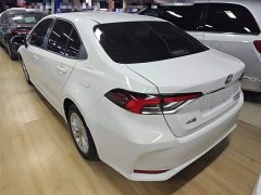 Toyota Corolla 2021 Hybrid 1.8L E-CVT Elite - ფოტო 5