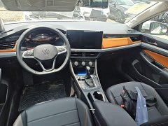 Volkswagen Bora Facelift 200TSI DSG Comfort Navigation Edition - ფოტო 12