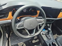 Volkswagen Bora Facelift 200TSI DSG Comfort Navigation Edition - ფოტო 13