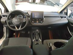 Toyota Corolla Hybrid 1.8H E-CVT Luxury - ფოტო 12