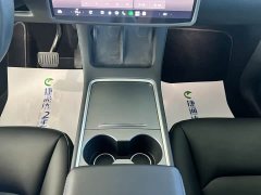 Tesla Model Y Rear-Wheel Drive - ფოტო 17