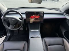 Tesla Model Y Rear-Wheel Drive - ფოტო 4