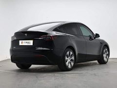 Tesla Model Y Rear-Wheel Drive - ფოტო 3