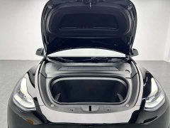 Tesla Model Y Standard Range RWD - ფოტო 11