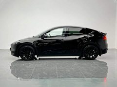 Tesla Model Y Standard Range RWD - ფოტო 3