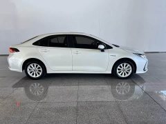 Toyota Corolla 2021 Hybrid 1.8L E-CVT Elite - ფოტო 3