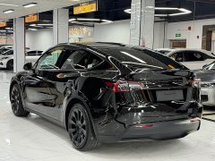 Tesla Model Y Rear-Wheel Drive - ფოტო 4