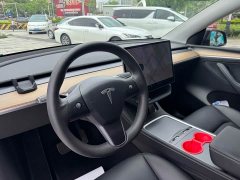 Tesla Model Y Standard Range RWD - ფოტო 9