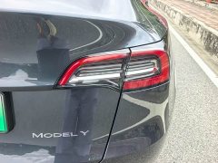 Tesla Model Y Rear-Wheel Drive - ფოტო 16