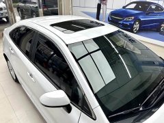 Toyota Corolla Hybrid 1.8H E-CVT Luxury - ფოტო 11