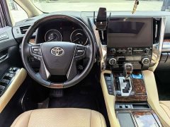 Toyota Alphard 2021 Hybrid 2.5L Luxury - ფოტო 12
