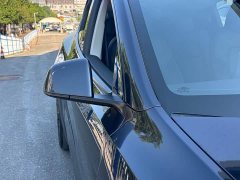 Tesla Model Y Rear-Wheel Drive - ფოტო 12