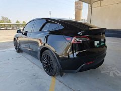 Tesla Model Y Long Range All-Wheel Drive - ფოტო 4