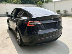 Tesla Model Y Standard Range RWD - ფოტო 9