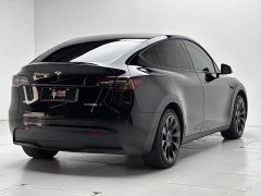 Tesla Model Y Rear-Wheel Drive - ფოტო 4