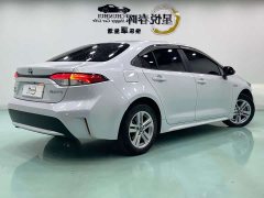 Toyota Corolla Hybrid 1.8H E-CVT Luxury - ფოტო 9
