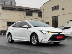 Toyota Corolla Hybrid 1.8H E-CVT Luxury - ფოტო 2
