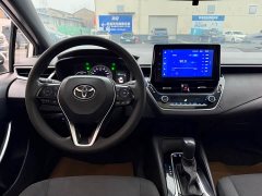 Toyota Corolla Hybrid 1.8H E-CVT Luxury - ფოტო 5