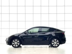 Tesla Model Y Standard Range RWD - ფოტო 10