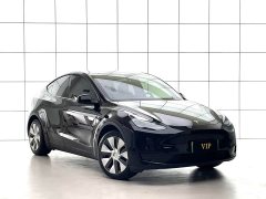 Tesla Model Y Standard Range RWD - ფოტო 9