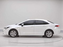 Toyota Corolla Hybrid 1.8H E-CVT Luxury - ფოტო 7