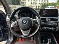BMW X1 sDrive20Li Fashion Edition - ფოტო 13