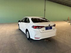 Toyota Corolla 2021 Hybrid 1.8L E-CVT Pioneer Edition - ფოტო 7