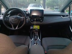 Toyota Corolla Hybrid 1.8H E-CVT Luxury - ფოტო 10