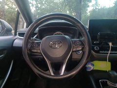 Toyota Corolla Hybrid 1.8H E-CVT Luxury - ფოტო 11