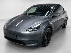 Tesla Model Y Standard Range RWD - ფოტო 1