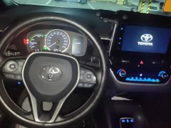 Toyota Corolla Hybrid 1.8H E-CVT Luxury - ფოტო 12