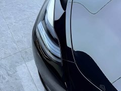 Tesla Model Y Rear-Wheel Drive - ფოტო 4