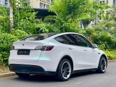 Tesla Model Y Standard Range RWD - ფოტო 9