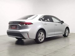 Toyota Corolla Hybrid 1.8H E-CVT Luxury - ფოტო 2