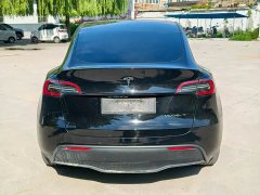 Tesla Model Y Rear-Wheel Drive - ფოტო 4