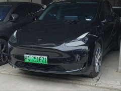 Tesla Model Y Rear-Wheel Drive - ფოტო 1