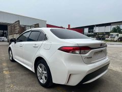 Toyota Corolla Hybrid 1.8H E-CVT Luxury - ფოტო 4