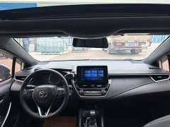 Toyota Corolla Hybrid 1.8H E-CVT Luxury - ფოტო 7