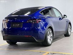Tesla Model Y Rear-Wheel Drive - ფოტო 4