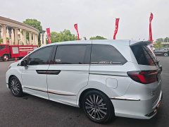 Honda Odyssey 2.0L e:HEV Luxury - ფოტო 7