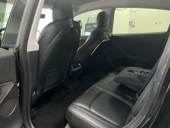 Tesla Model Y Standard Range RWD - ფოტო 11