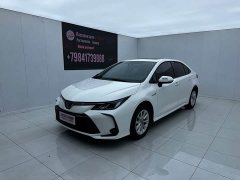 Toyota Corolla 2021 Hybrid 1.8L E-CVT Elite - ფოტო 1