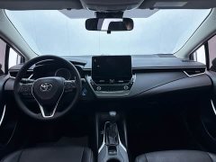 Toyota Corolla 2021 Hybrid 1.8L E-CVT Elite - ფოტო 6